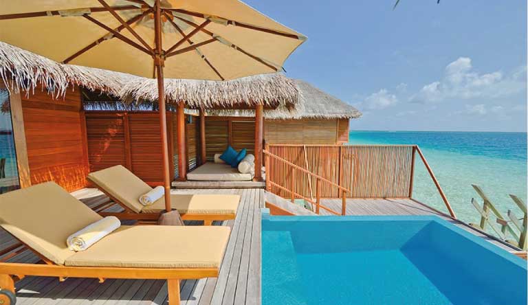 Sloping Sandbanks & Turquoise Waters at Huvafen Fushi photo 5