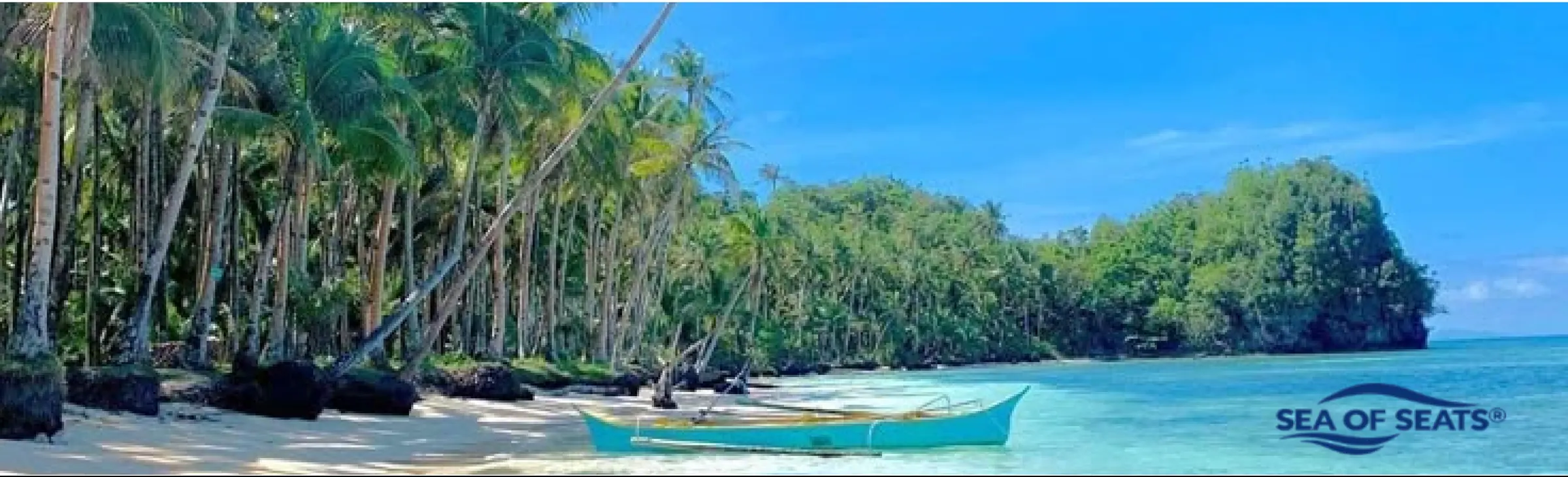 Tropical beach with a boat – Sea of Seats